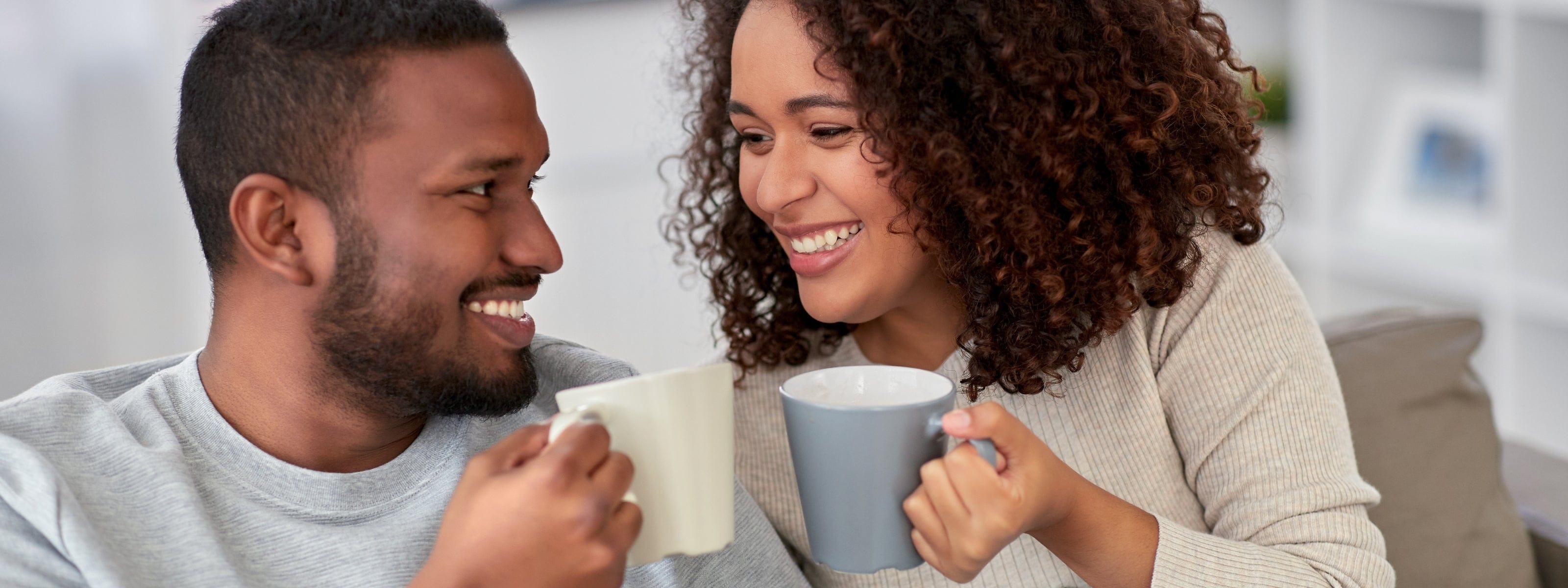 Mindful Rental Pros customer couple relaxing in comfort with coffee