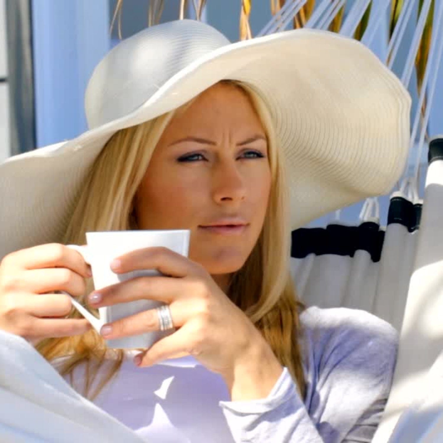 Mindful Rental Pros transformed customer in beach hammock